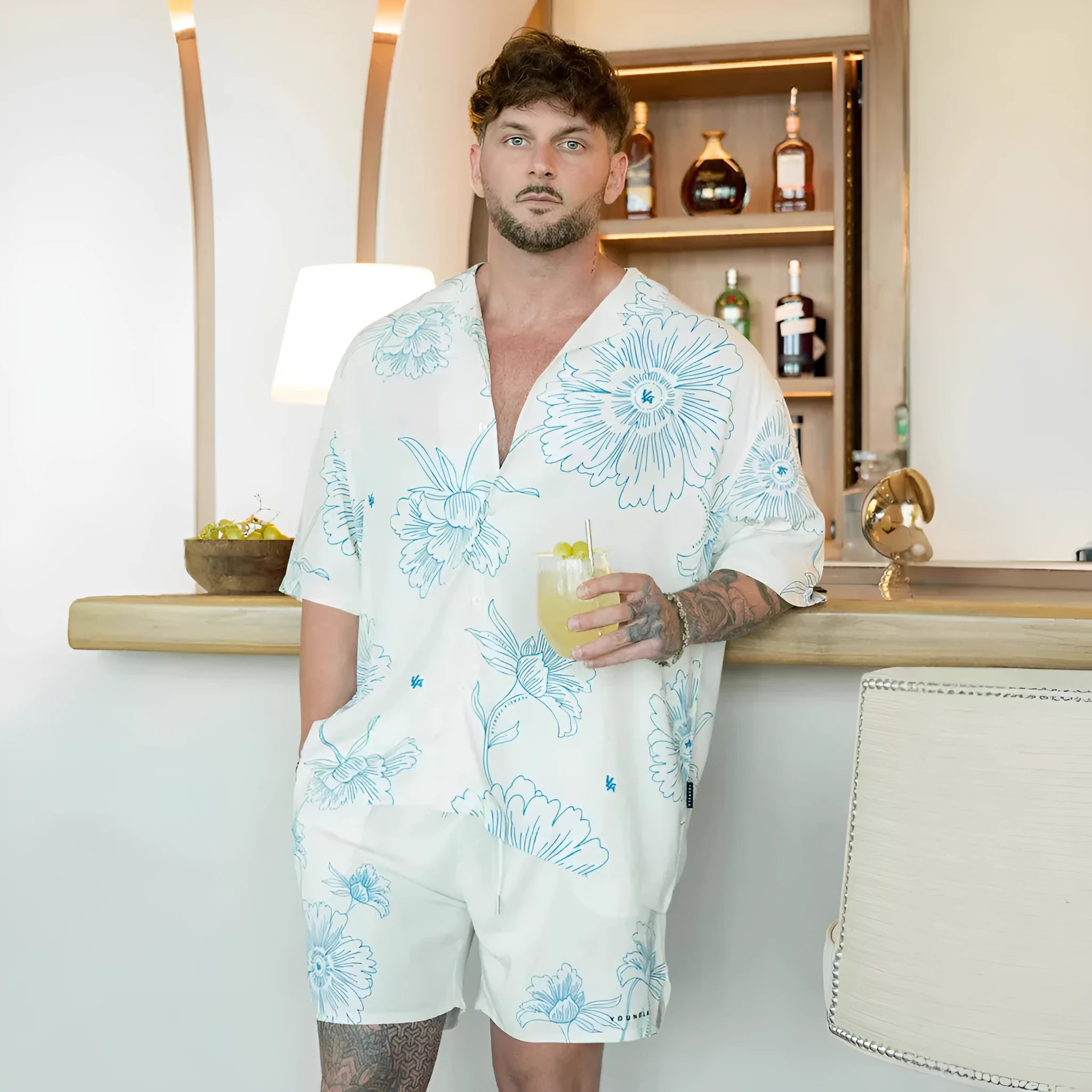 Men's loose fit short sleeve top with flower pattern printing in neutral colour options