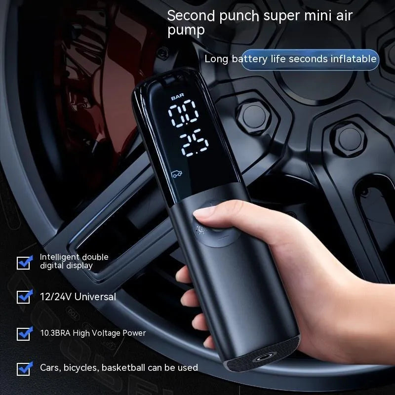 Black portable electric car air pump with tyre pressure gauge and inflation hose