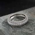 Geometric triangle zircon inlay ring on a copper band in a unisex design for proposals.