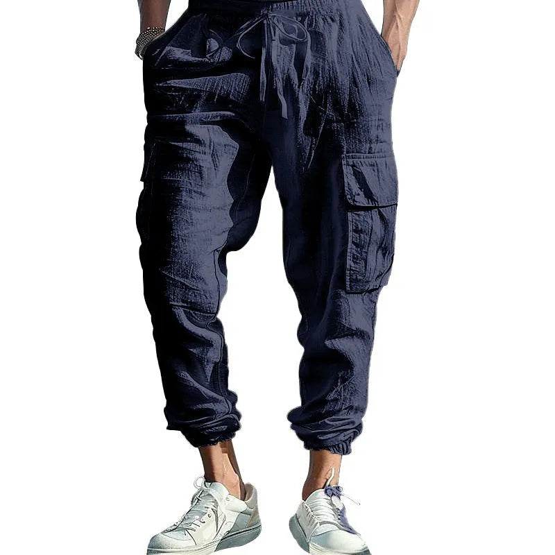 Men's linen casual trousers with elastic drawstring waist and ankle-tied cuffs in solid colours
