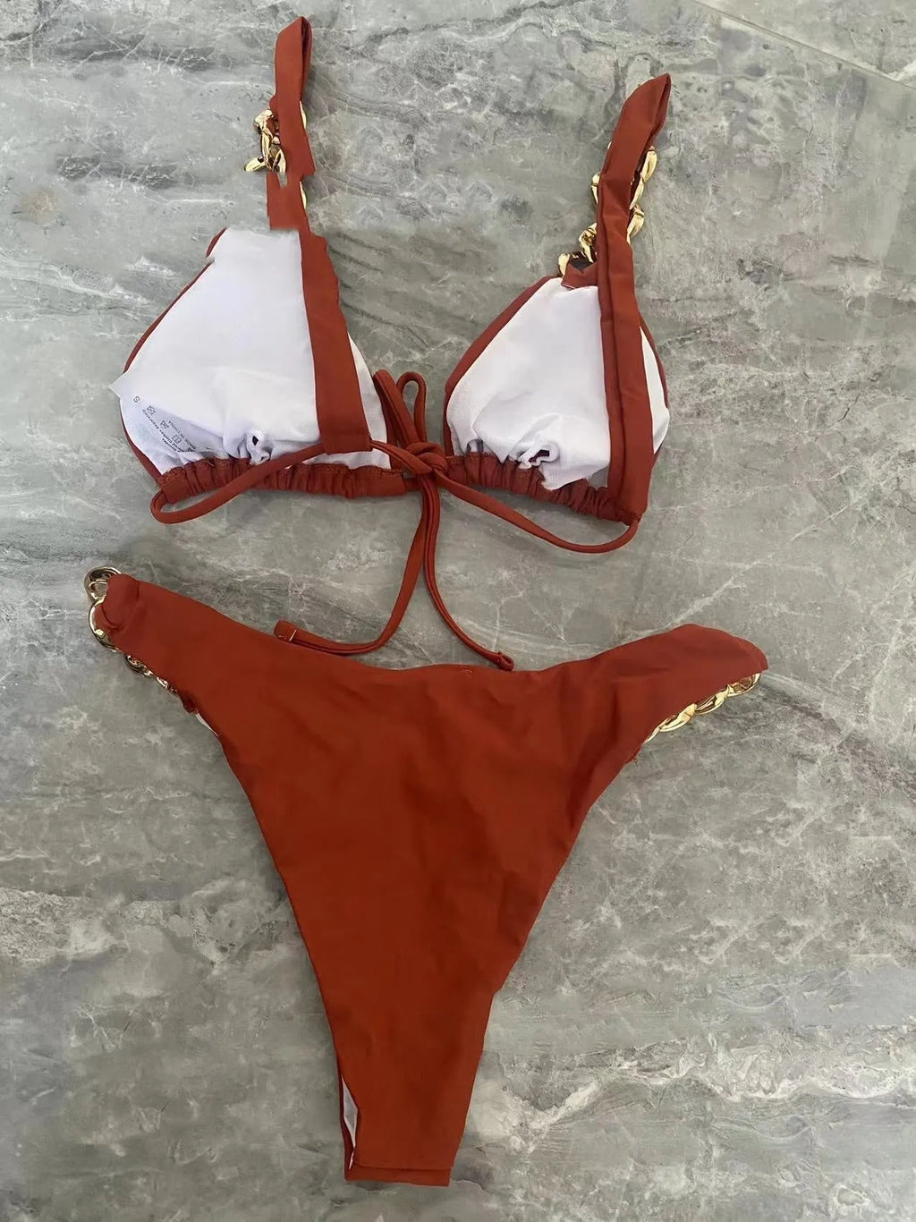 Brown women's tube top push up bikini swimsuit with ring tether detailing and sleeveless design