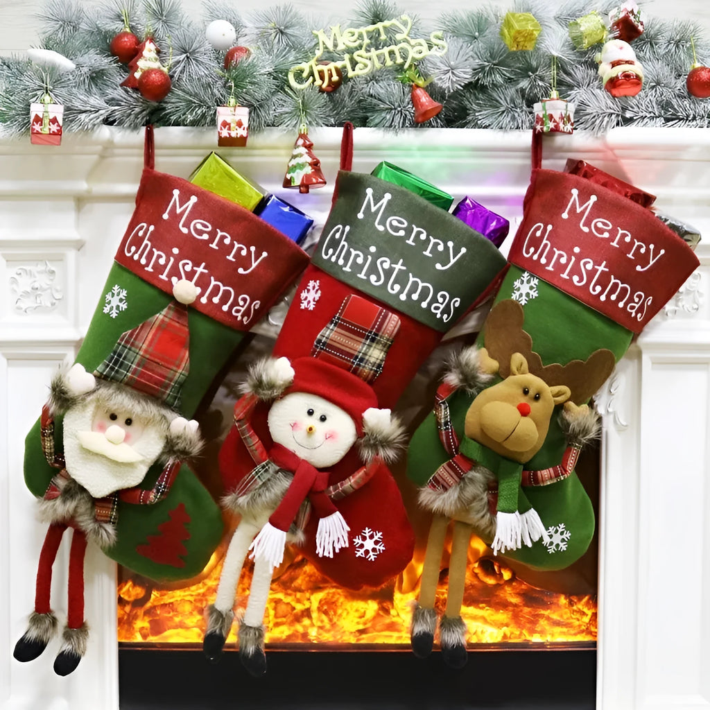 Set of three large Christmas stockings with Santa, Snowman, and Reindeer 3D designs hanging on a fireplace