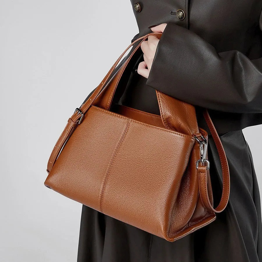 First layer cowhide messenger bag in horizontal square shape with double joint straps available in apricot black caramel and gray colours