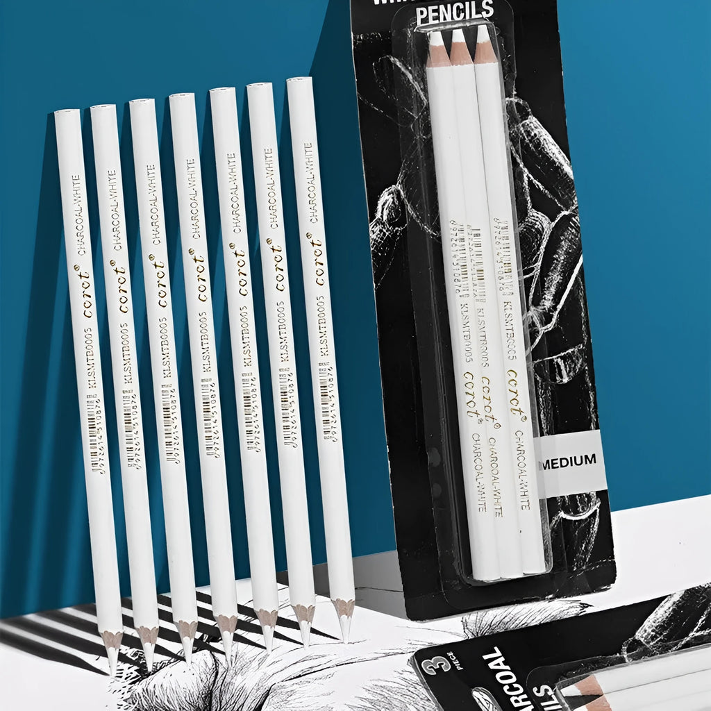 Set of three white charcoal pencils in wooden barrels for artistic highlighting