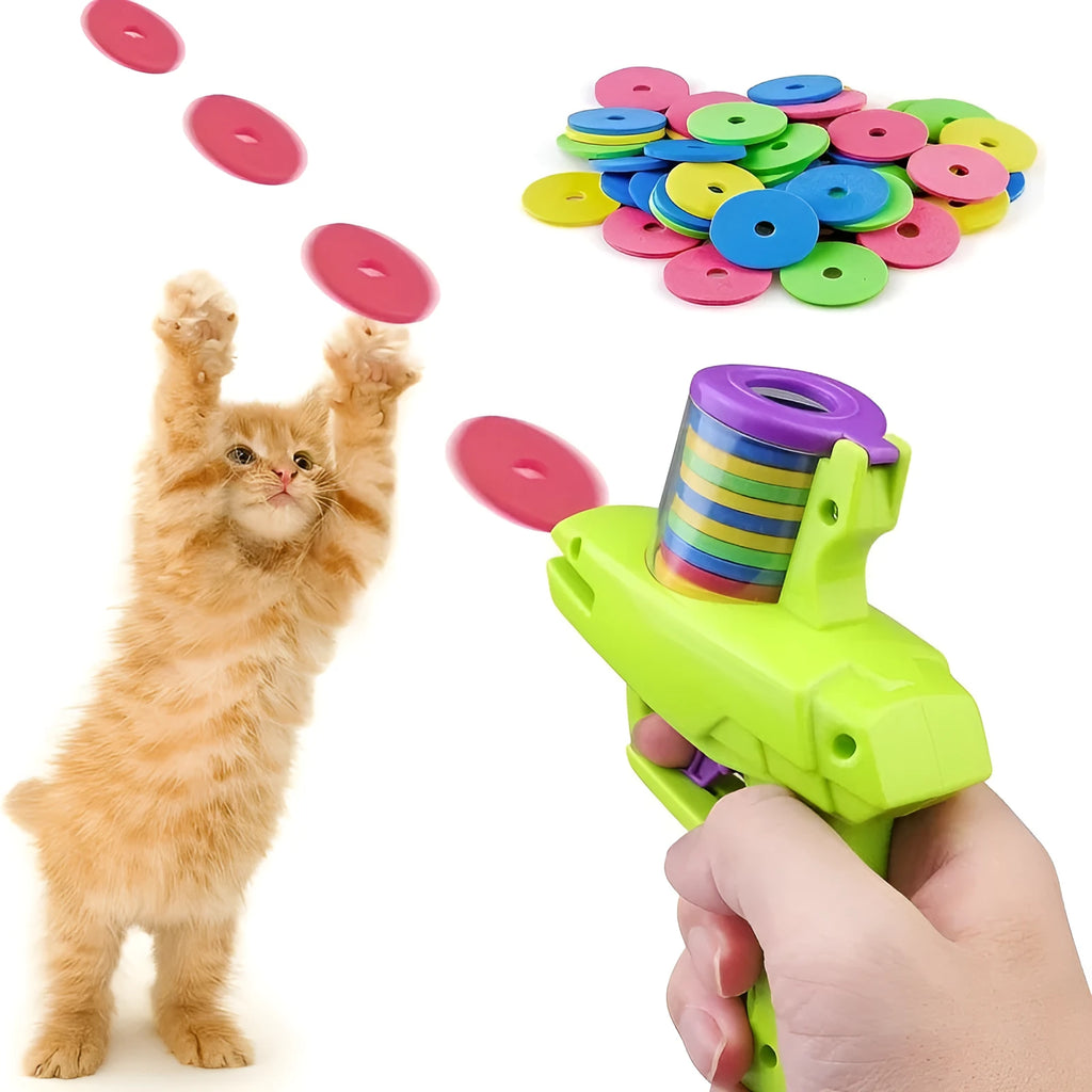 Green durable plastic cat toy launcher with a foam disc ready for launch.