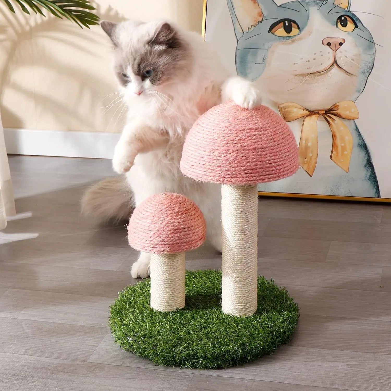 Pink mushroom-shaped cat scratching post with natural sisal covering on cap and pole