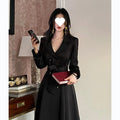 Retro waist-controlled double-breasted long coat in black polyester fibre with long sleeves, front view