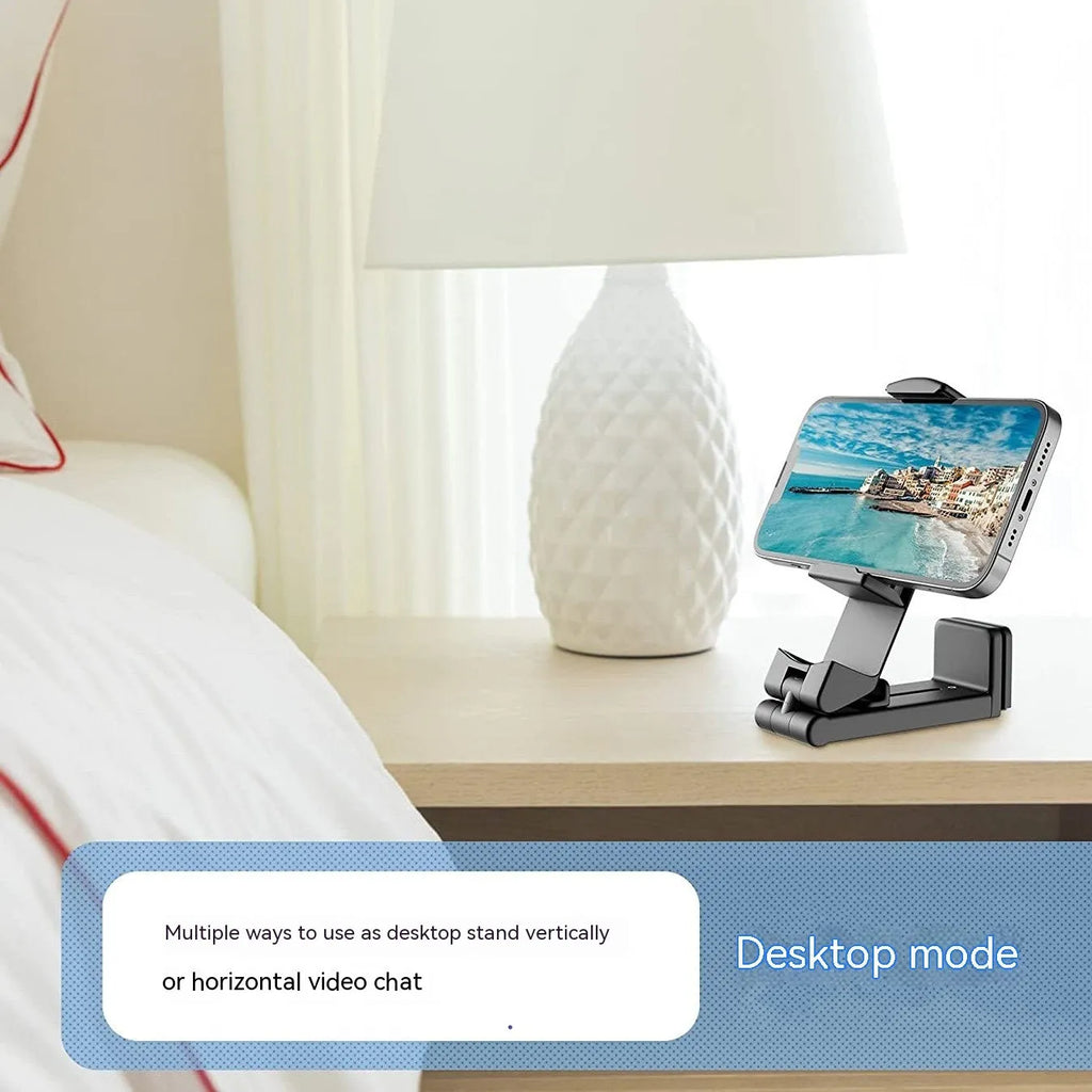 Foldable rotating phone holder in black with mobile phone attached showing adjustable angle mechanism