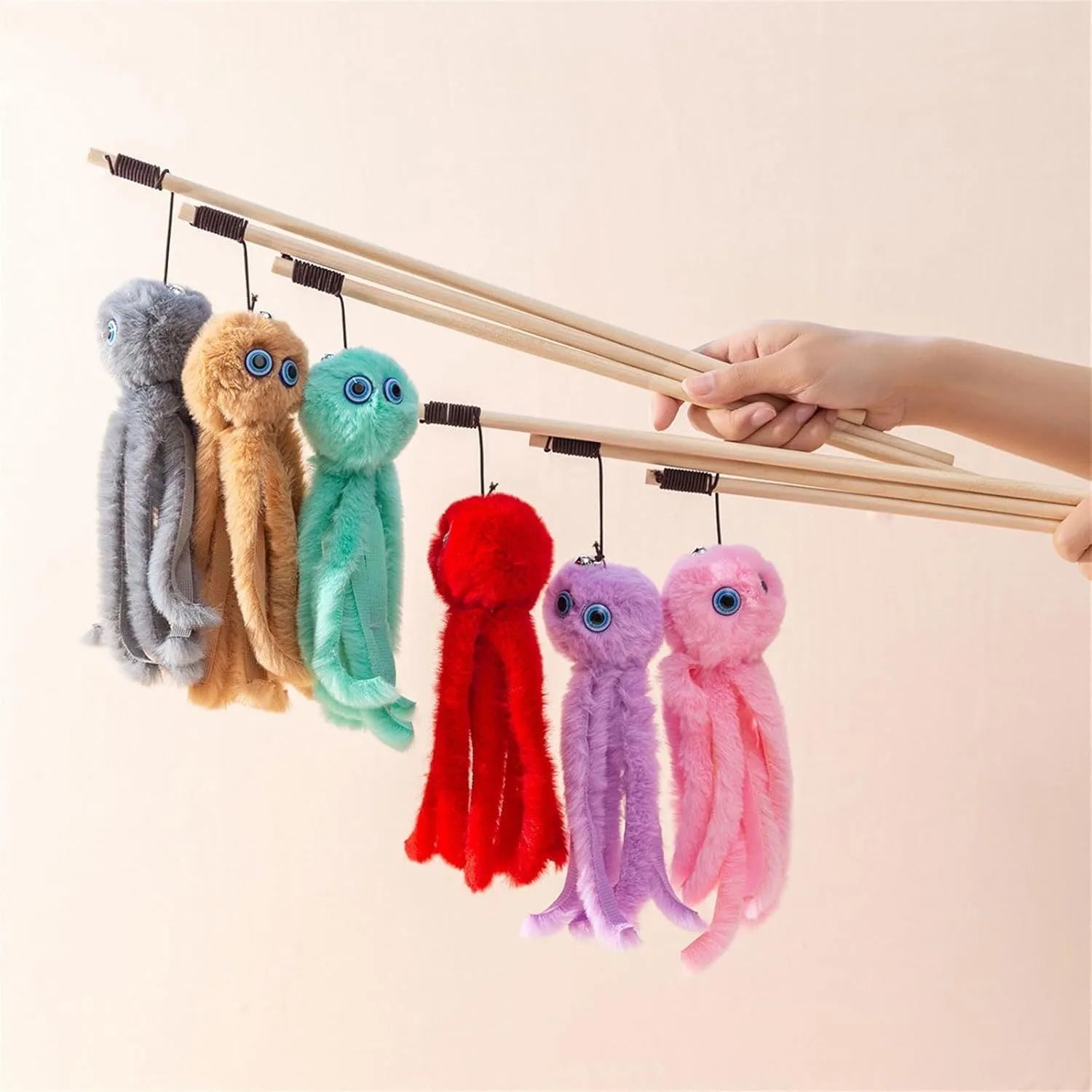 Octopus-themed cat toy with long handle in bright colours for indoor pet play