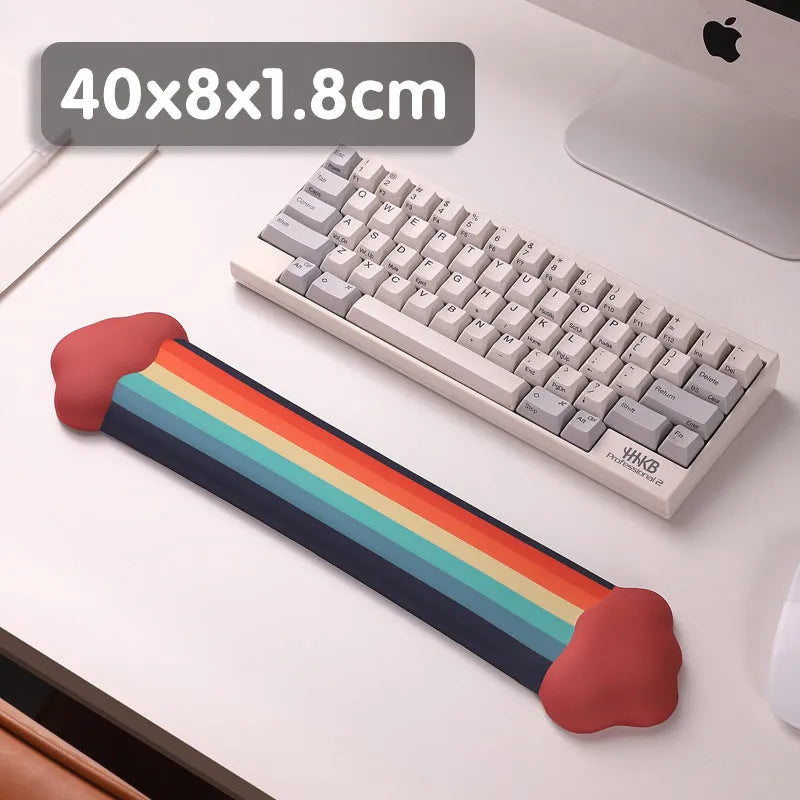 Silicone gel wrister mouse pad and keyboard support set with white cloud pattern on a desk.