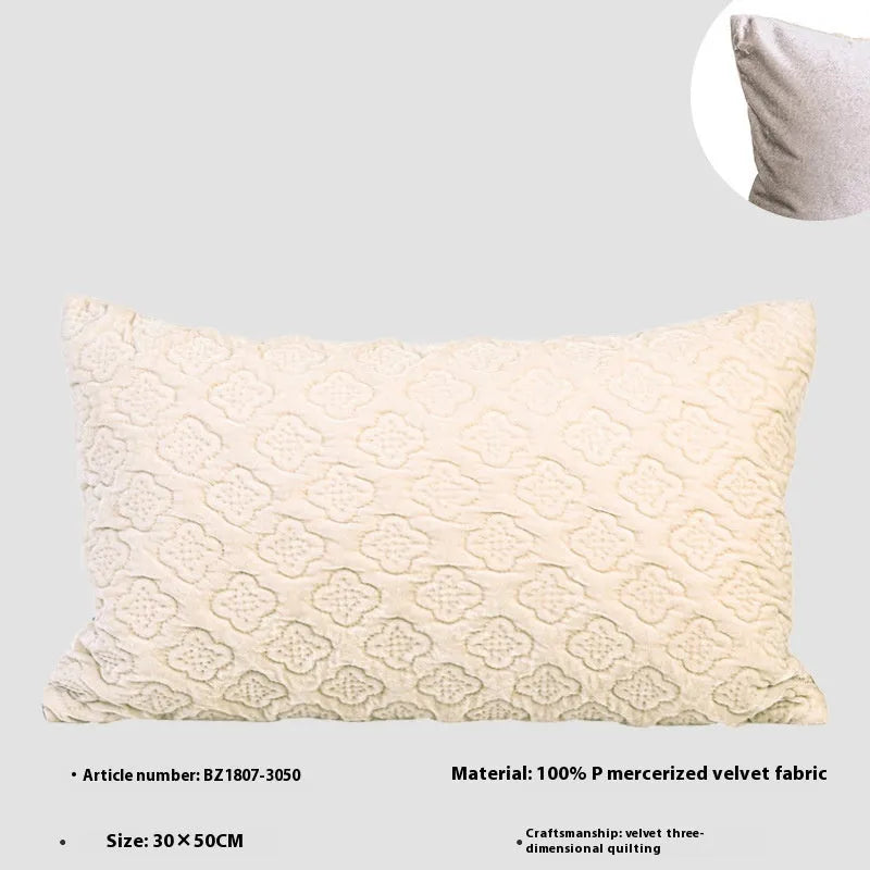 Brown gold antique-style quilted square cushion pillow and matching lumbar pillow on a sofa.
