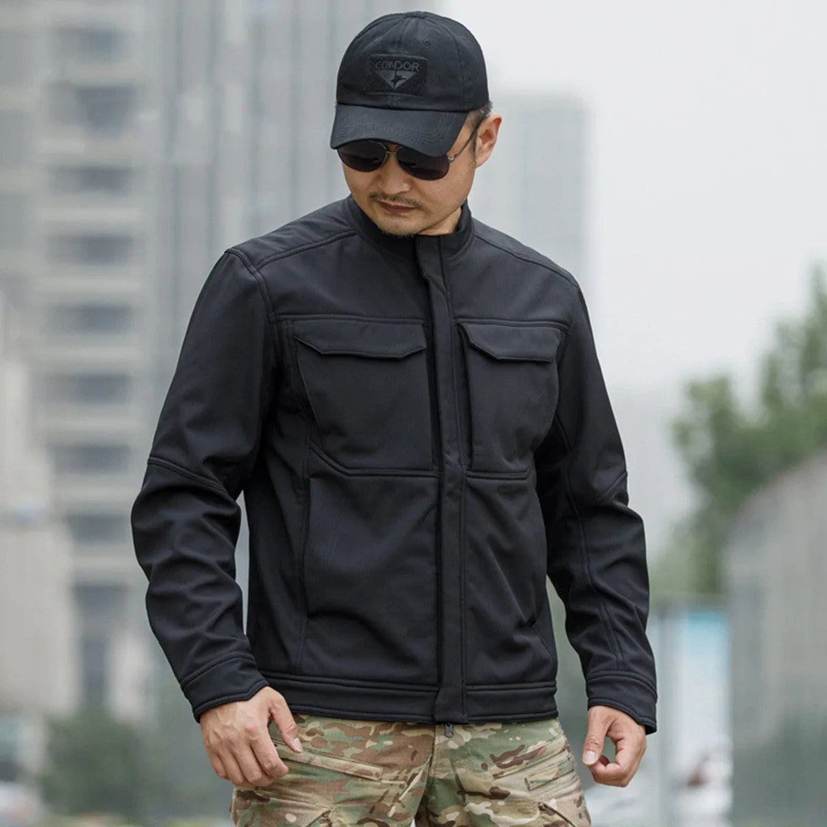 Bone Frog Peak Breaker soft shell tactical jacket in black camouflage colour for outdoor mountaineering.