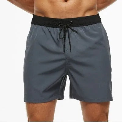 Men's blue stitching waist running shorts with a zippered pocket and drawstring.