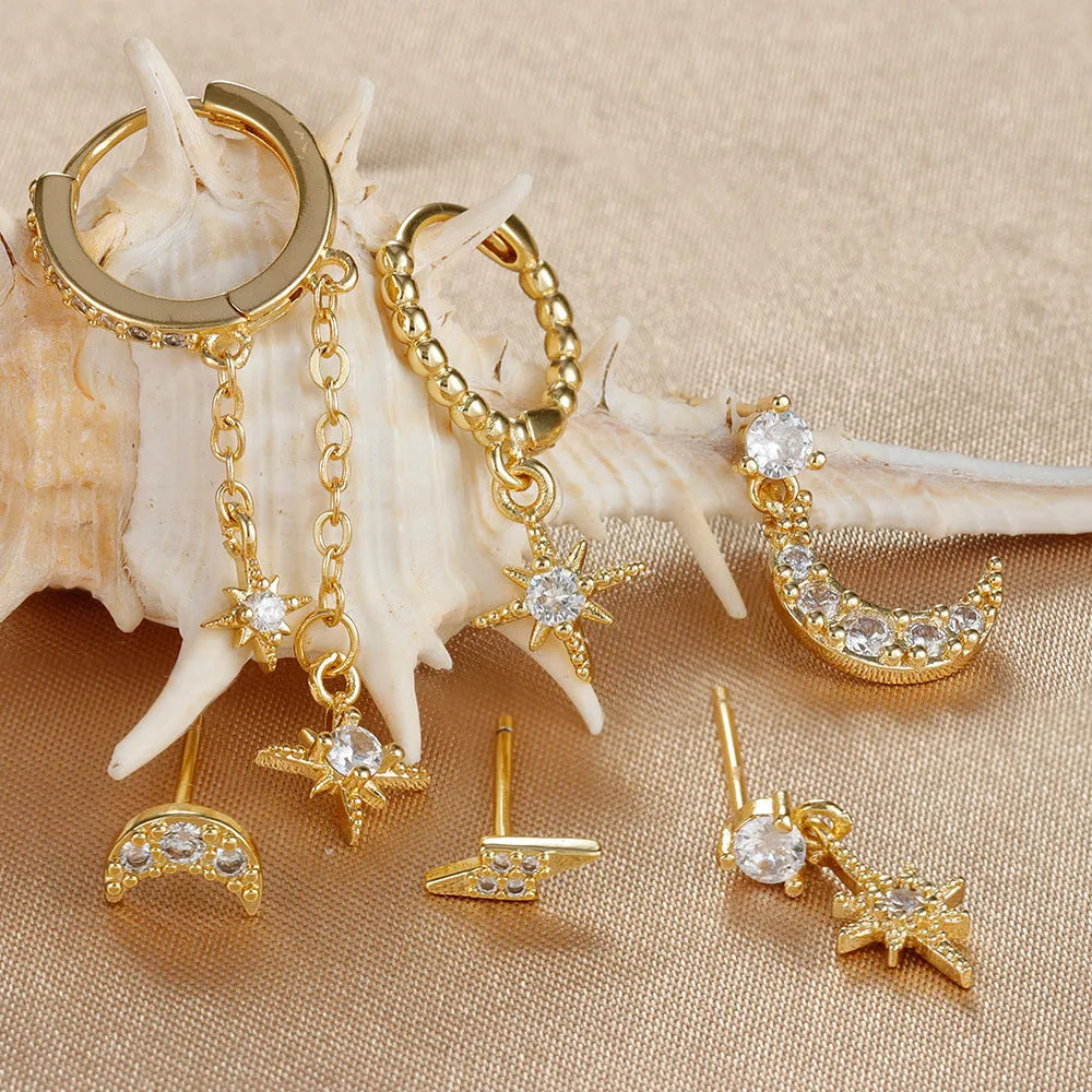 Gold colour XINGX chain tassel earrings set with six pieces showing zircon stud details