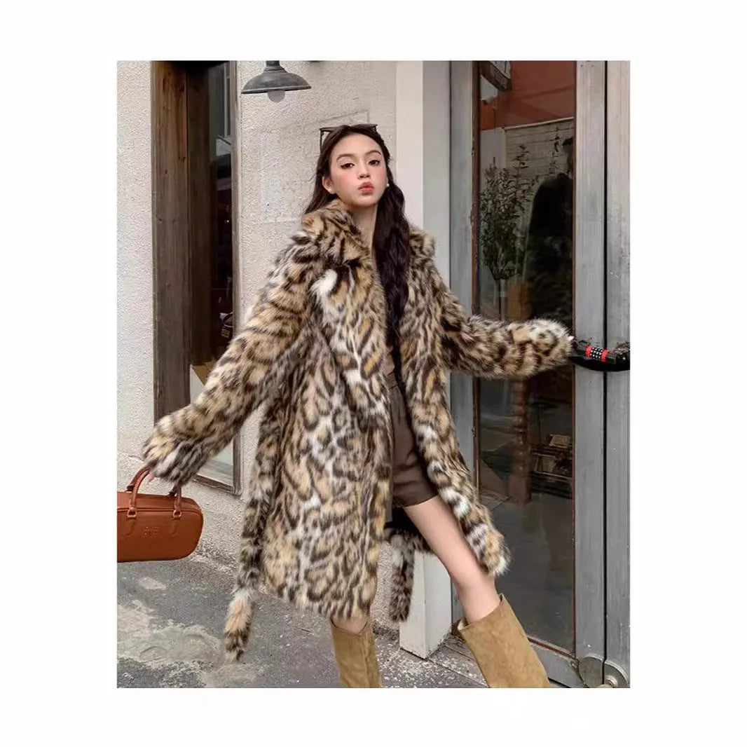 Faux fur coat with fur collar available in mid-length or long style with pockets