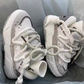 Women's grey retro chunky sneakers with thick rubber sole and lace-up front