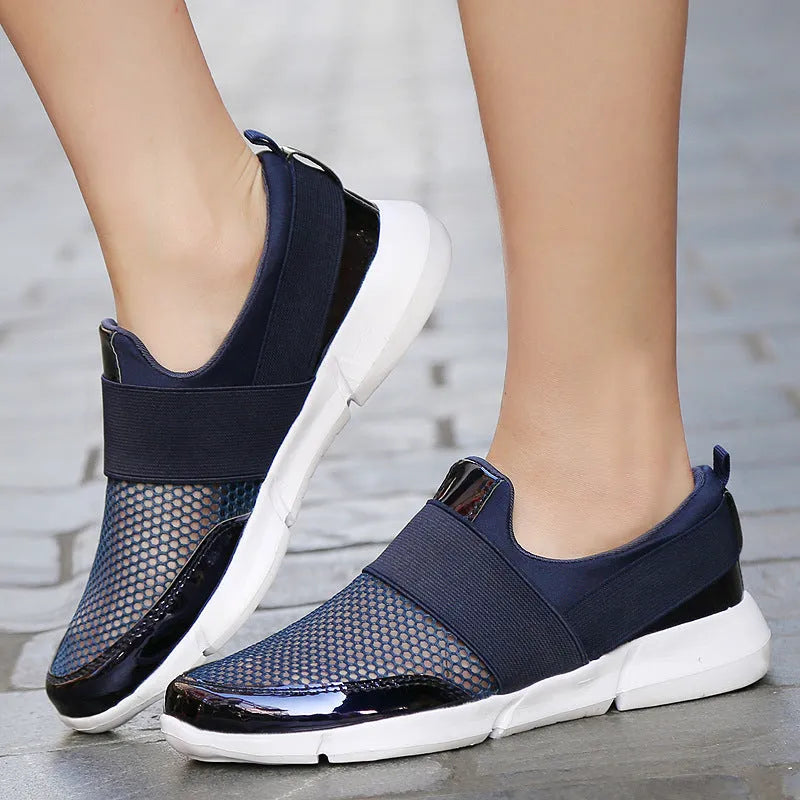 Breathable low top mesh sneakers for women in blue, black or grey, showcasing lightweight casual design.