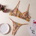 Women's floral patterned bikini underwear set in polyester fabric shown in multiple colours.