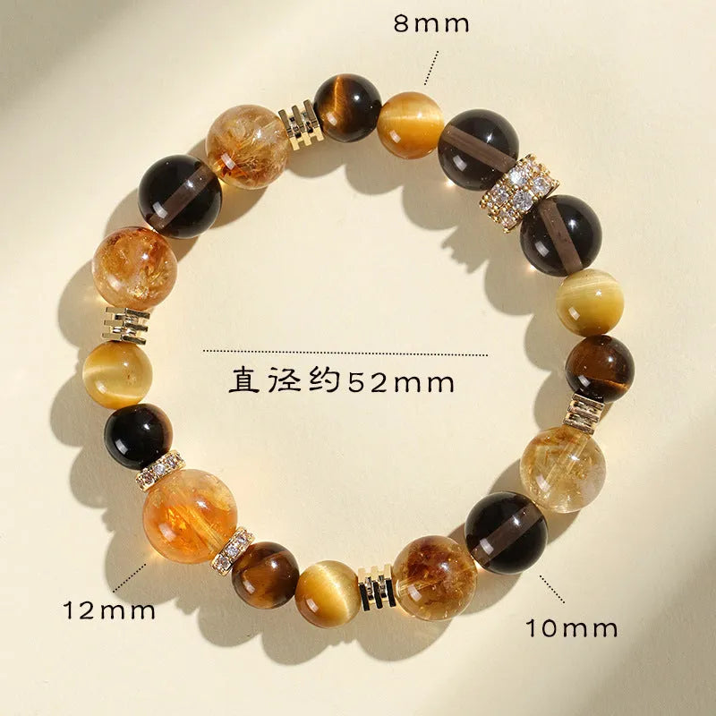 Close-up of a natural yellow artificial crystal string bead bracelet with 10mm tower-shaped beads.