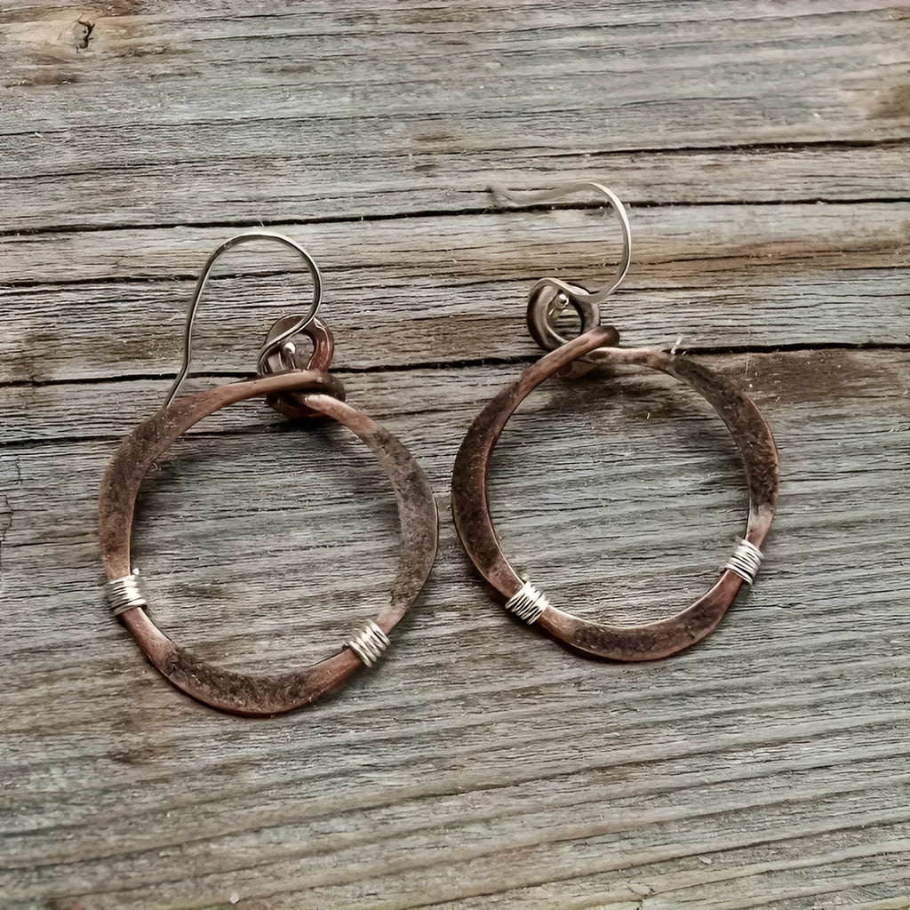 Bronze retro hollow round geometric bohemian earrings for women on light background