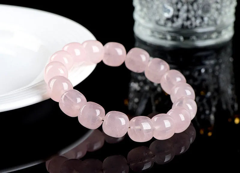 Pink crystal and bamboo bracelet with 11-12mm barrel beads and geometric design