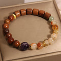 Pineapple yellow women's bracelet with yellow tower crystal, ebony amethyst beads, pearl and rhinestone decorations