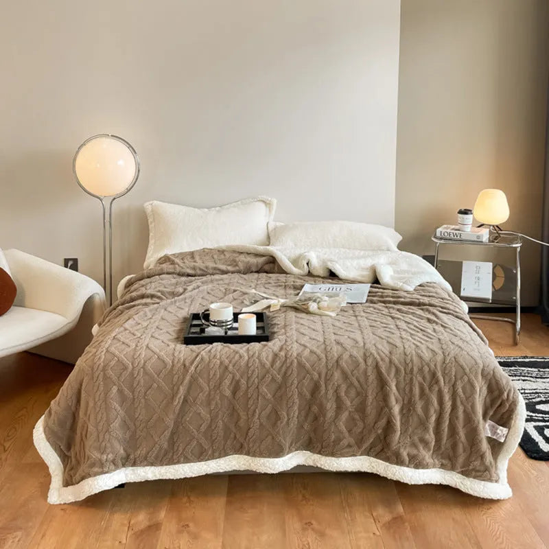 Polyester thermal flannel blanket in tea green colour, shown on a bed, size 180x200cm.