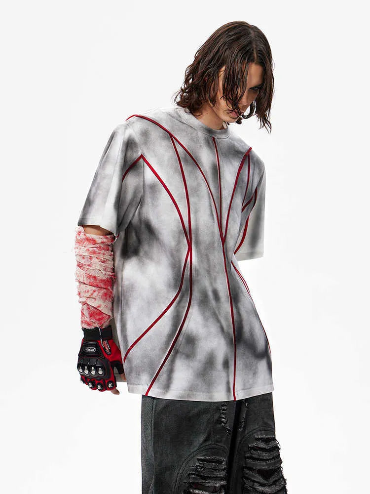 Short sleeve T-shirt with padded shoulders and textured line patchwork design