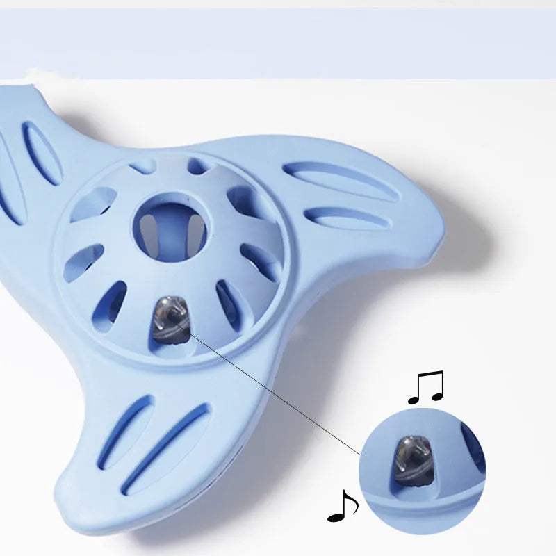 Blue bite-resistant boomerang chew toy for medium and large breed dogs on a plain background