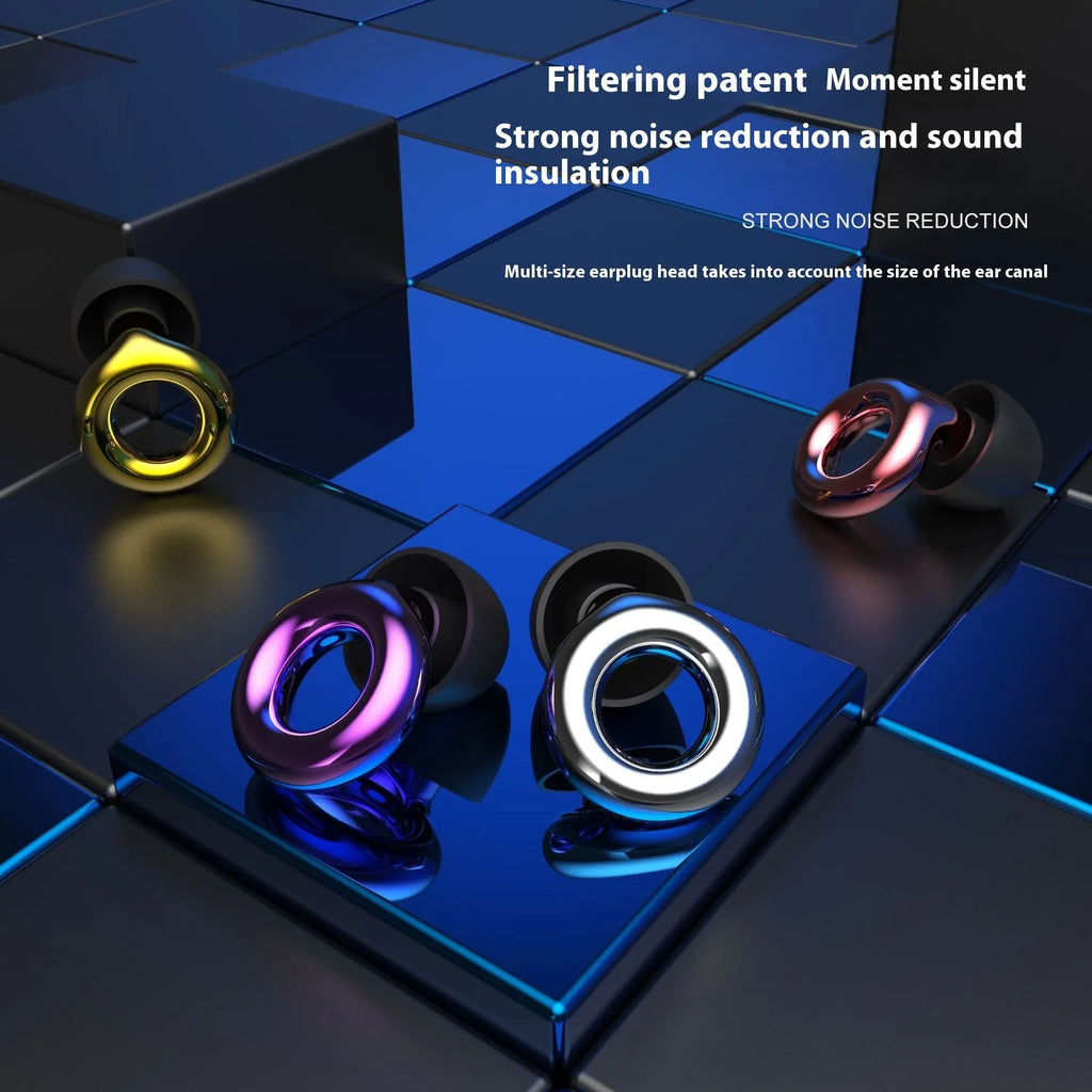 Set of noise reduction earplugs in various colours with a storage case and spare silicone caps.