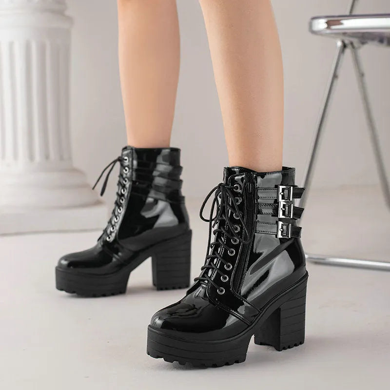 Women's black thick-heeled short boots with lace-up front, round toe, and waterproof platform sole