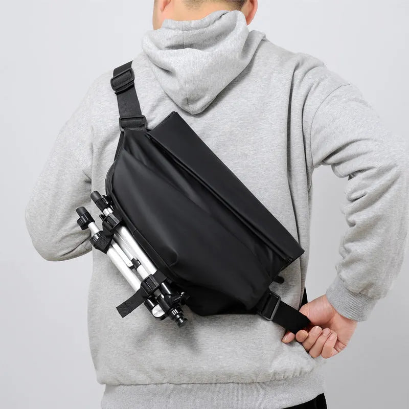 Grey medium-sized crossbody bag for men with shoulder strap and zipper opening