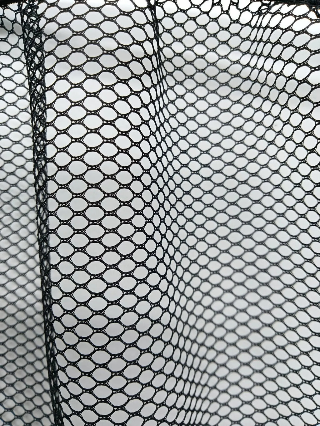 Polyester elastic storage net for car boot organisation in 20x35cm or 20x45cm size.