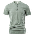 Men's slub cotton short sleeve t-shirt in denim blue, showing textured fabric and pullover style.