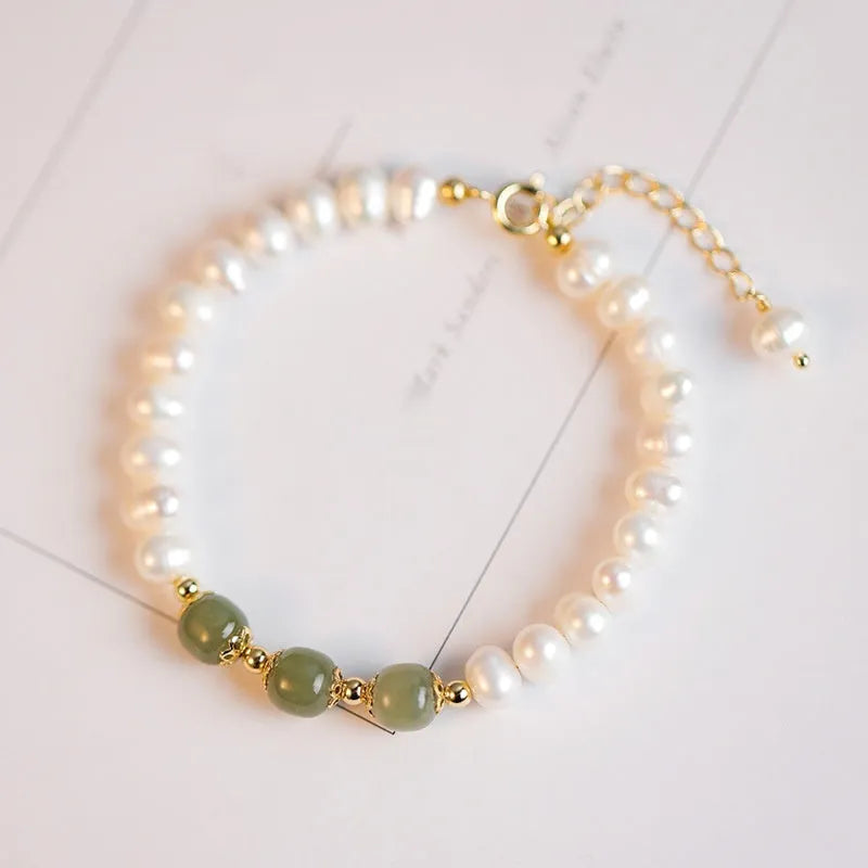 Freshwater pearl bracelet with diamond-shaped charm in electroplated Hetian jade colour