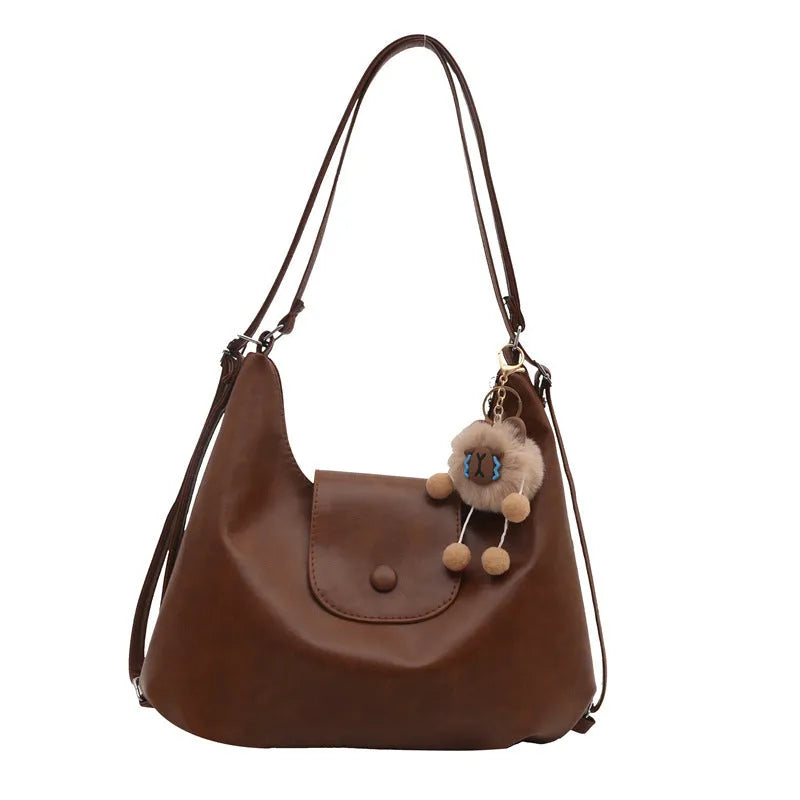 Women's black PU leather horizontal square shoulder bag with single strap and mobile phone compartment
