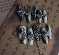 Heavy industry blue evening gloves with twinkling rose and tulip floral pattern showing full hand coverage
