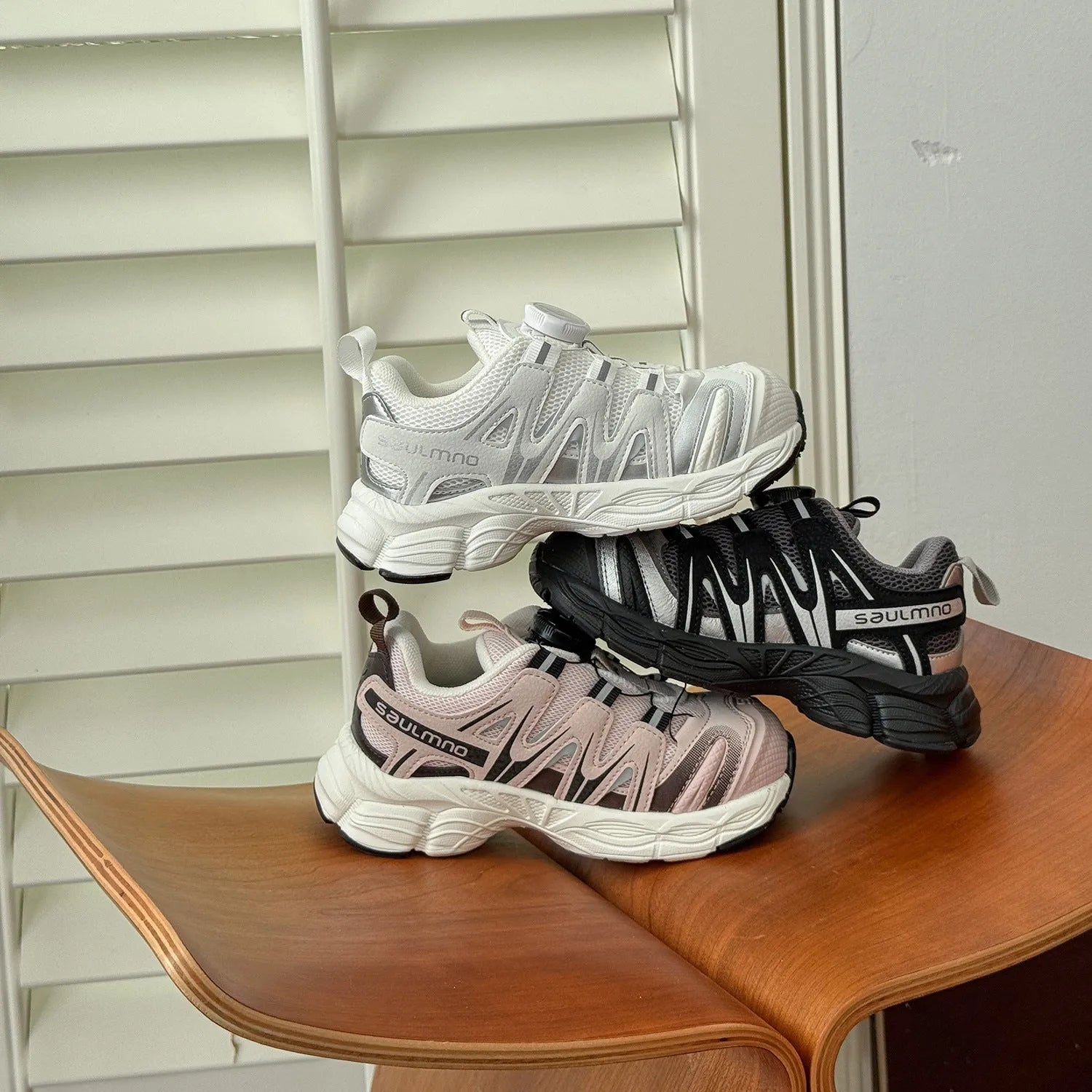 Lightweight beige casual shoes with a PU leather mesh upper and soft sole on a plain background.