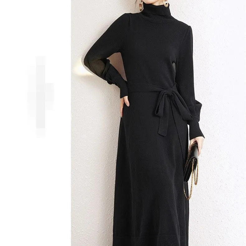 Rose red loose fit turtleneck knitted dress with long sleeves and a midi-length skirt.