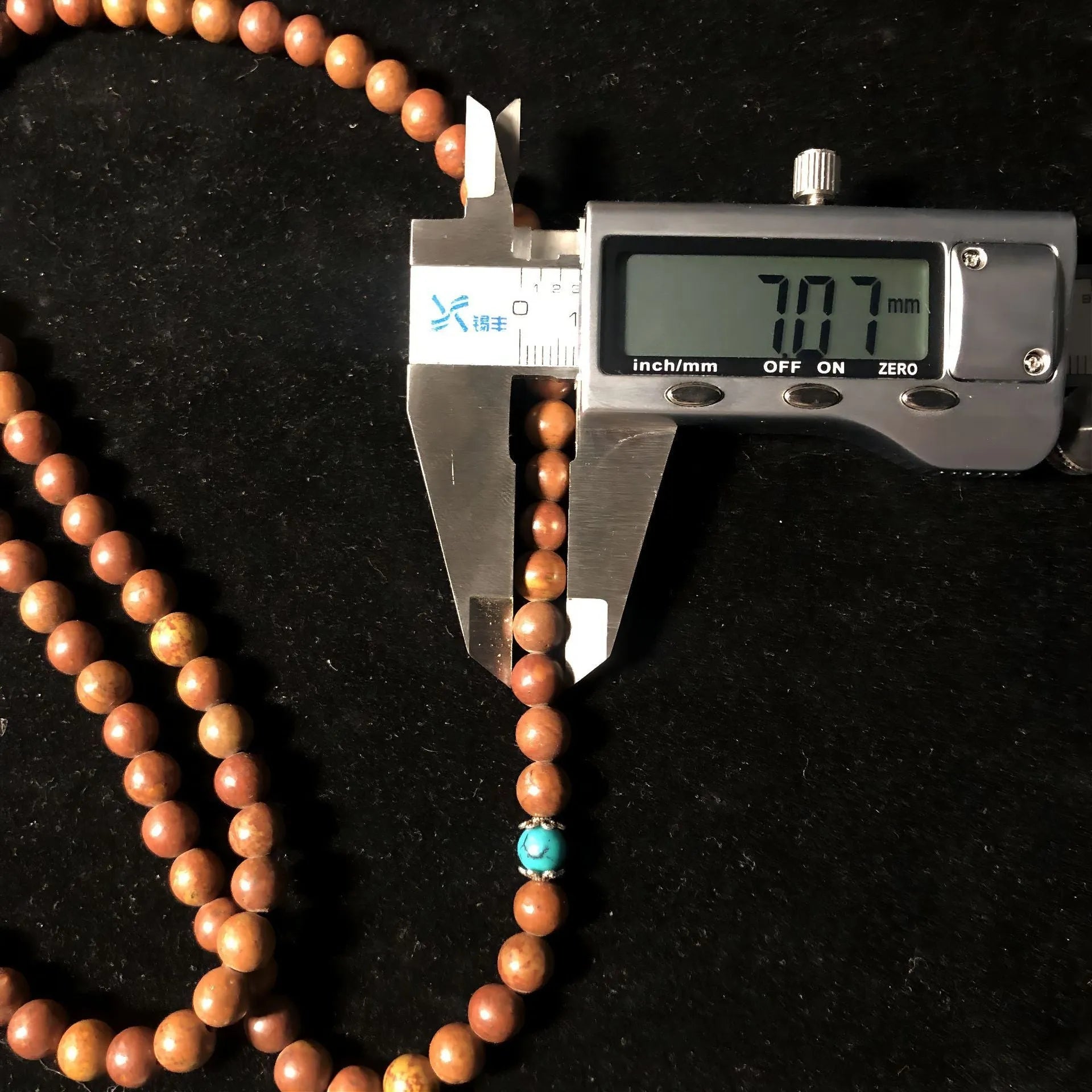 108-bead stone bracelet with hand-polished geometric lvzhu beads