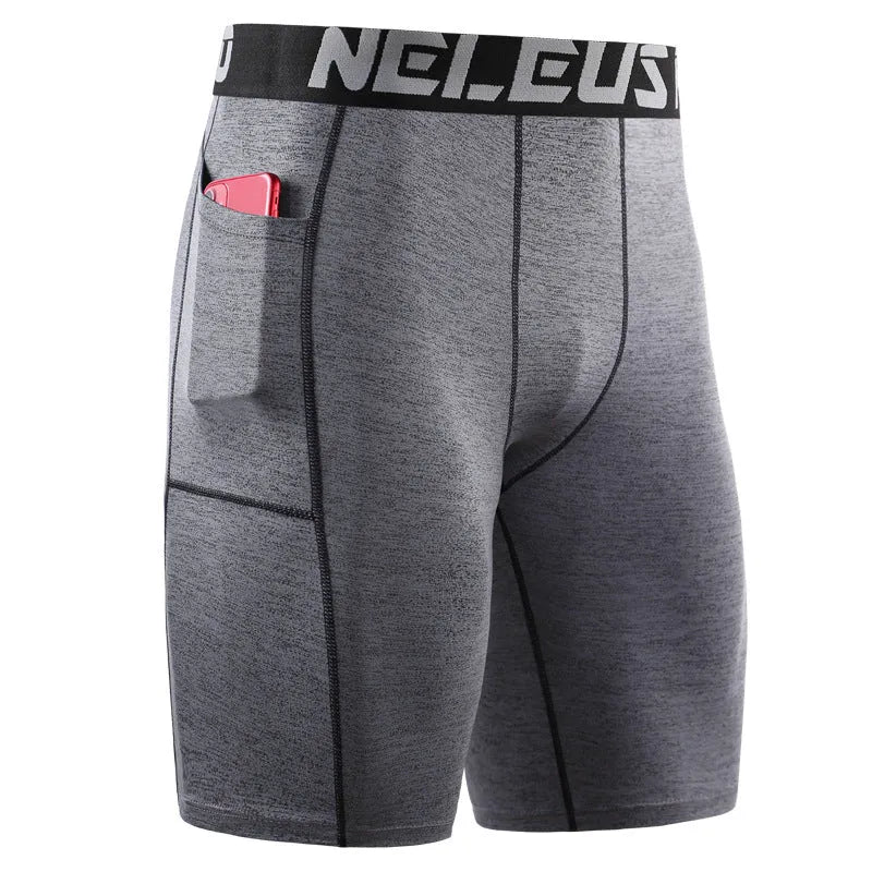 Man wearing black tight-fitting milk silk polyester sports shorts for running or fitness.