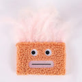 Colourful catnip plush toy with explosion head shape in blue, green, orange, and purple options