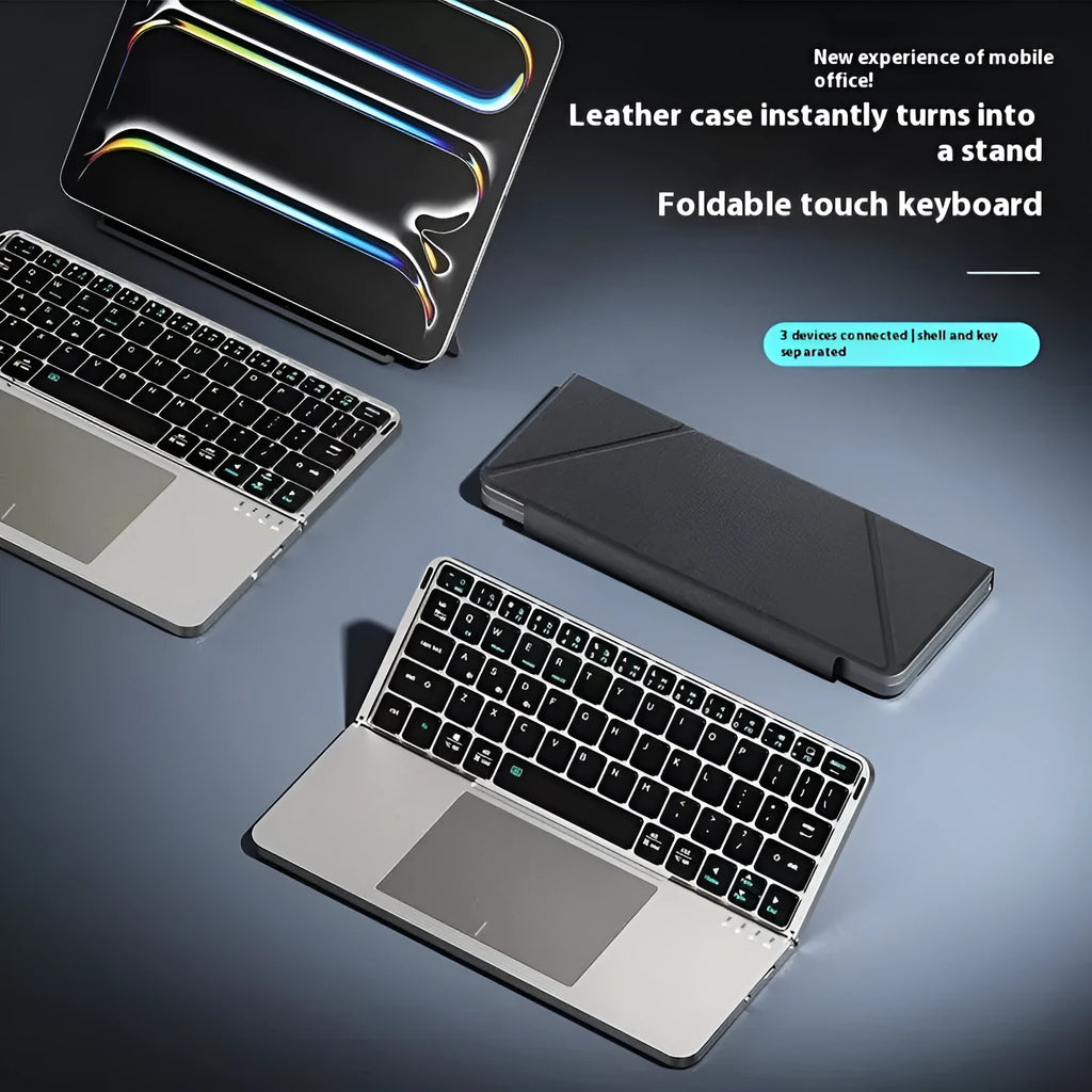 Grey wireless Bluetooth folding keyboard shown open for use with mobile phones and tablets