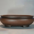 Handmade classical style purple clay ceramic desktop flowerpot measuring 58cm long by 47cm high.