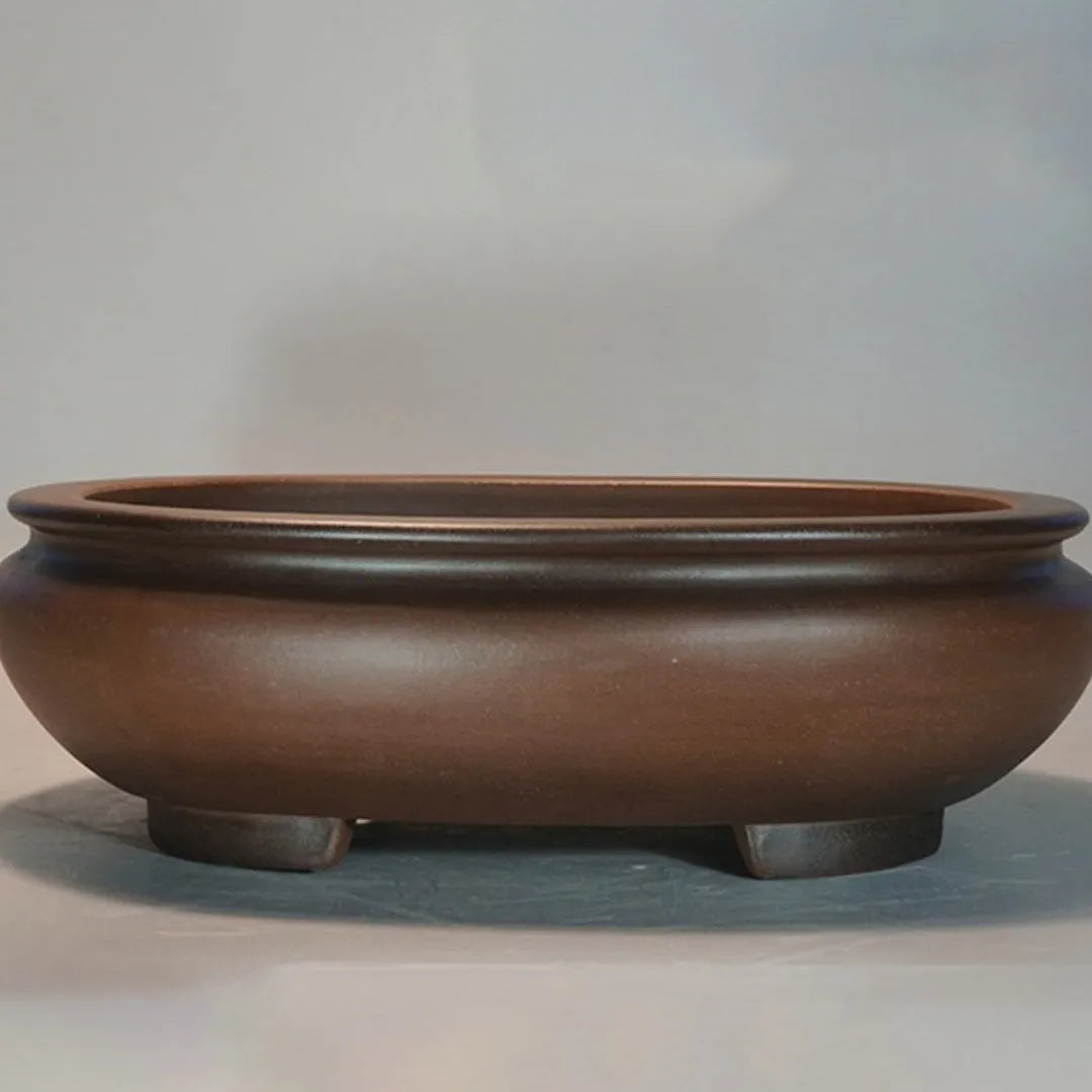 Handmade classical style purple clay ceramic desktop flowerpot measuring 58cm long by 47cm high.