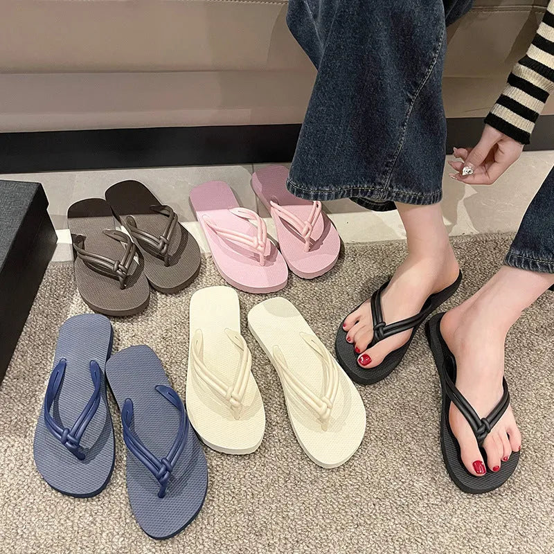 Men's casual PVC flip flops in beige with toe-covering style and injection moulded sole.