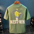 Green loose fit men's T-shirt with a printed literary youth graphic on the front.