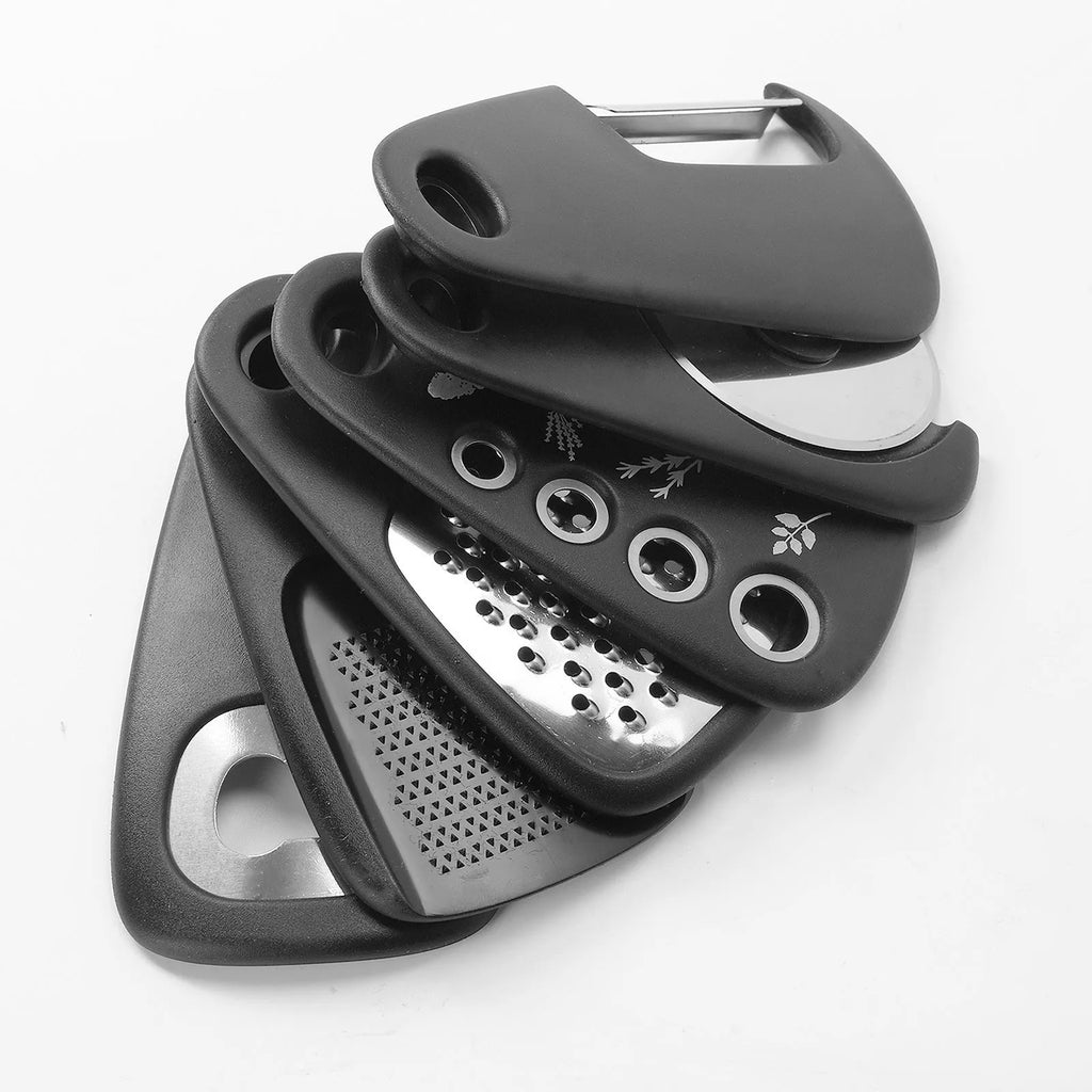 Six stackable kitchen gadget utensils and a cleaning brush in a colour box