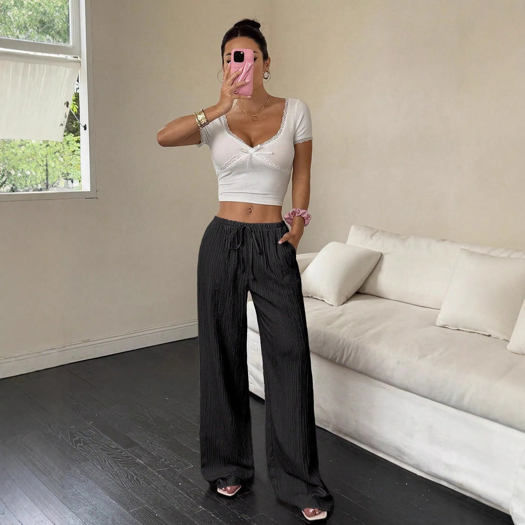 Women's black wide-leg trousers with lace-up waist trimming, casual mid-rise fit