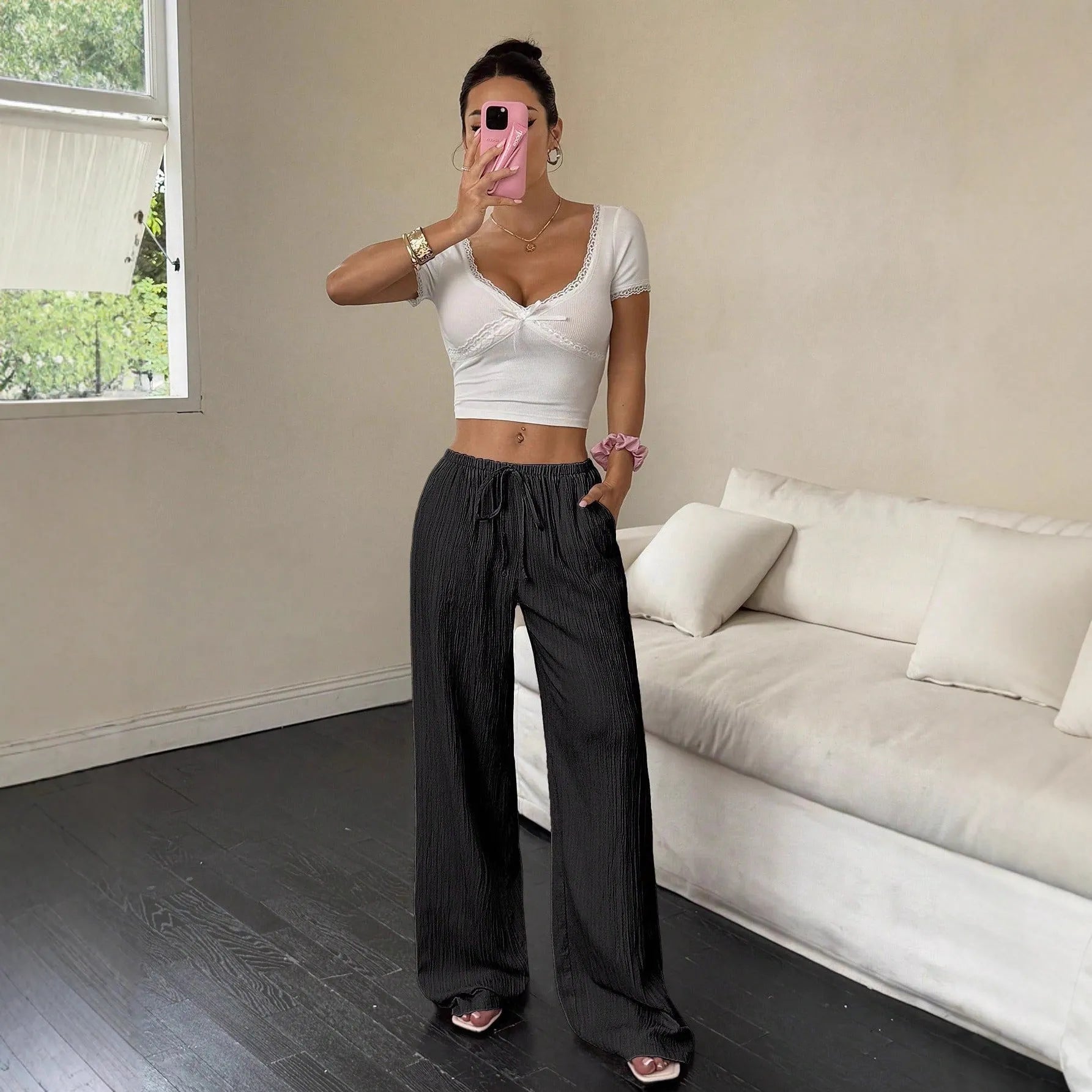 Women's black wide-leg trousers with lace-up waist trimming, casual mid-rise fit
